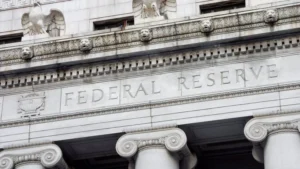 Fed Holds Rates Steady as New Chair Kevin Warsh Signals Hawkish Shift Amid Rising Inflation Projections